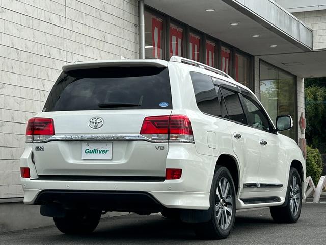 ランドクルーザー ZX 後期 禁煙 純正エアロキット メーカーナビ 後席モニタ 後期・禁煙・純正エアロキット・メーカーナビ・パノラミックビューモニター・後席モニター・ブラインドスポット・サンルーフ・レザー・シートヒーター/クーラー・ステアヒーター・衝突軽減・追従クルコン(3枚目)