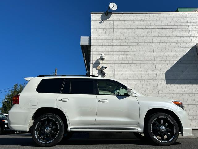 ランドクルーザー ＡＸ　中期　ＯＰサンルーフ　２２インチアルミ　エアロキット　ワンオーナー・中期・禁煙・ＯＰサンルーフ・ＯＰルーフレール・ＵＬＴＲＡモータースポーツ２２インチ・エルフォードエアロキット・モデリスタリアスポイラー・ＥＣＬＩＰＳＥナビ・ＡＬＰＩＮＥ後席モニター（11枚目）