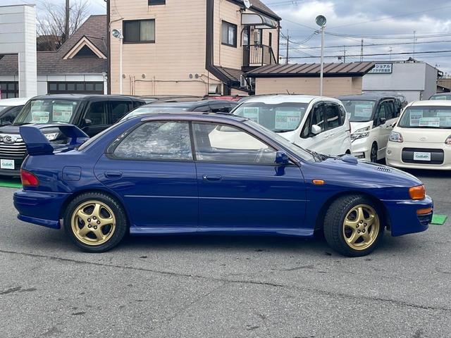 ＷＲＸ　ＳＴｉバージョンＩＩ　５５５　限定５００台　ワークスレプリカ　２７５ｐｓ　限定車専用スバルブルー　４ＷＤ　５速ＭＴ　オーディオＤＥＨ－４９０　ＥＴＣ　ブースト計　ＮＡＲＤＩハンドル　ルーフベンチレータ　純正１６インチアルミ　マット(63枚目)