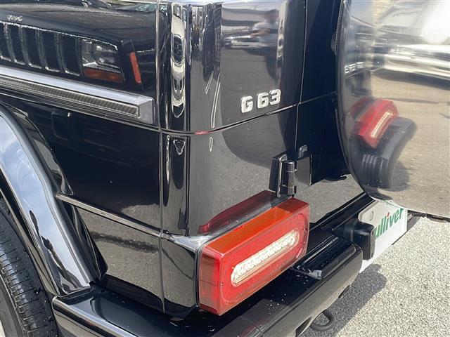 Ｇ３２０　ロング　Ｇ６３調カスタム　パナメグリル　ＳＲ　黒革　バックカメラ　ディスプレイオーディオ　サイド出マフラーエンド　ＬＥＤテール　イカリングライト　バンパー　背面ハードカバー　ＥＴＣ　シートヒーター　後席モニタ(22枚目)