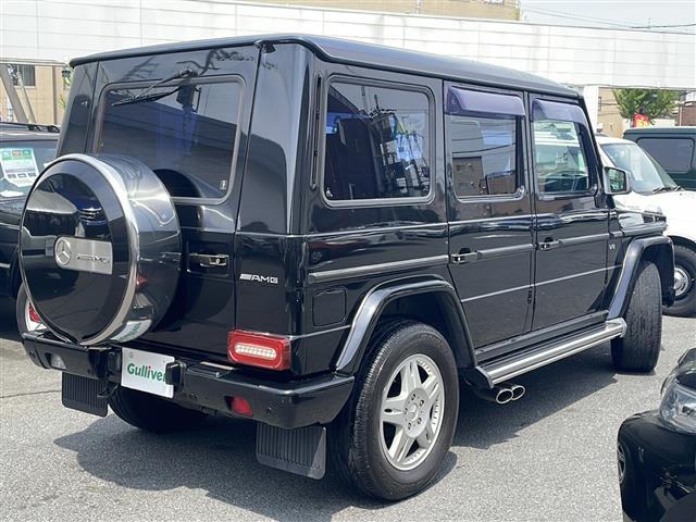 Ｇ３２０　ロング　Ｇ６３調カスタム　パナメグリル　ＳＲ　黒革　バックカメラ　ディスプレイオーディオ　サイド出マフラーエンド　ＬＥＤテール　イカリングライト　バンパー　背面ハードカバー　ＥＴＣ　シートヒーター　後席モニタ(24枚目)