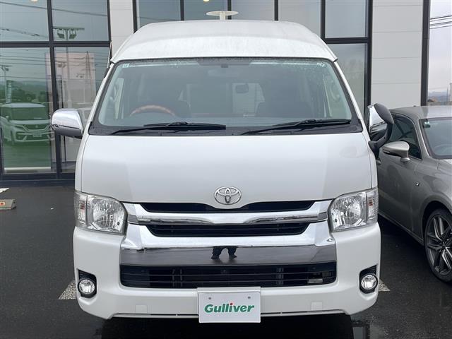 ハイエースバン ロングワイドスーパーGL ・4WD・キャンピング仕様・シンク・冷蔵庫・電子レンジ・FFヒーター・換気扇・テレビ・外部電源・取り外しテーブル・可変式ベッド・社外SDメモリナビ・・バックカメラ・片側パワースライドドア(4枚目)