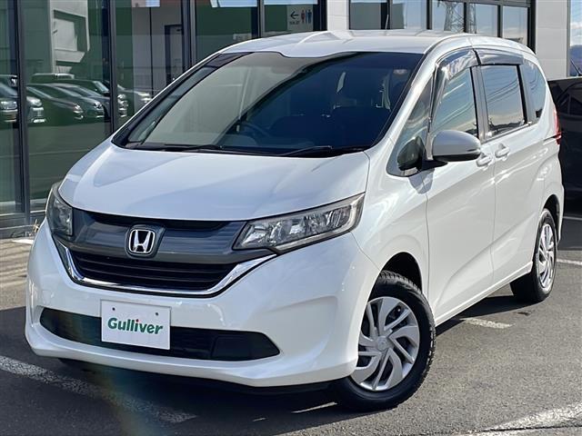 フリード Ｇ・ホンダセンシング　・４ＷＤ・社外ＳＤメモリナビ（ＣＤ・ＤＶＤ・ＢＴ・フルセグ・ＳＤ・ｉｐｏｄ）・バックカメラ・両側パワースライドドア・横滑り防止装置・ワイパーデアイサー・ホンダセンシング・ビルトインＥＴＣ（2枚目）