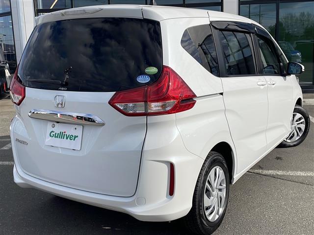 フリード Ｇ・ホンダセンシング　・４ＷＤ・社外ＳＤメモリナビ（ＣＤ・ＤＶＤ・ＢＴ・フルセグ・ＳＤ・ｉｐｏｄ）・バックカメラ・両側パワースライドドア・横滑り防止装置・ワイパーデアイサー・ホンダセンシング・ビルトインＥＴＣ（3枚目）