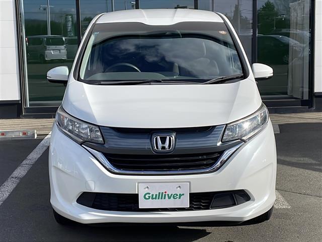 フリード Ｇ・ホンダセンシング　・４ＷＤ・社外ＳＤメモリナビ（ＣＤ・ＤＶＤ・ＢＴ・フルセグ・ＳＤ・ｉｐｏｄ）・バックカメラ・両側パワースライドドア・横滑り防止装置・ワイパーデアイサー・ホンダセンシング・ビルトインＥＴＣ（4枚目）