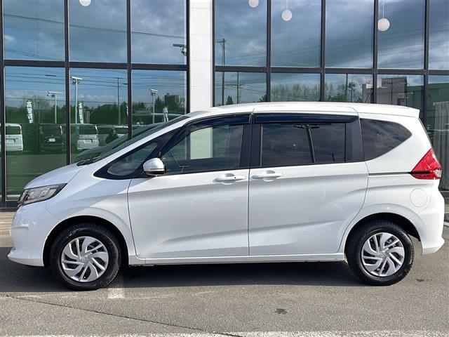 フリード Ｇ・ホンダセンシング　・４ＷＤ・社外ＳＤメモリナビ（ＣＤ・ＤＶＤ・ＢＴ・フルセグ・ＳＤ・ｉｐｏｄ）・バックカメラ・両側パワースライドドア・横滑り防止装置・ワイパーデアイサー・ホンダセンシング・ビルトインＥＴＣ（6枚目）