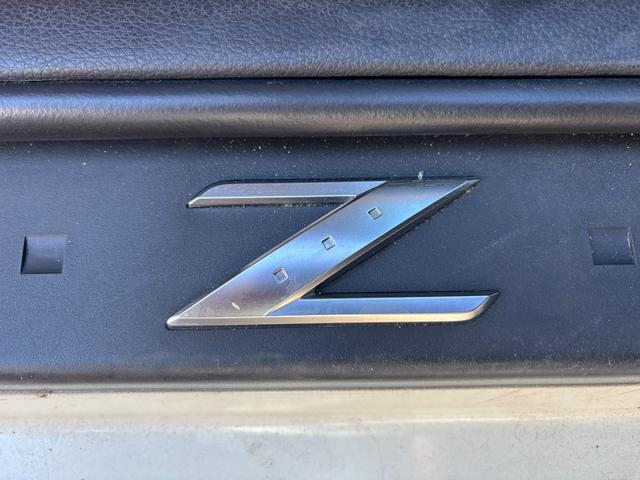 フェアレディZ バージョンT BOSEサウンド 7スピーカー 6CDチェンジャー ETC 本革シート シートヒーター パワーシート HIDライト オートエアコン 純正17インチアルミホイール キーレスエントリー スペアキー(37枚目)