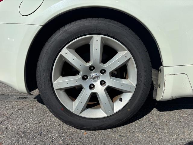 フェアレディZ バージョンT BOSEサウンド 7スピーカー 6CDチェンジャー ETC 本革シート シートヒーター パワーシート HIDライト オートエアコン 純正17インチアルミホイール キーレスエントリー スペアキー(59枚目)