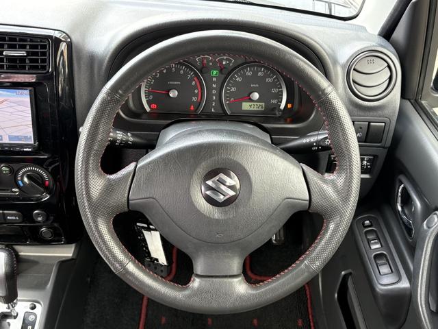 ジムニー クロスアドベンチャー　禁煙　パートタイム４ＷＤ　背面タイヤ　ＥＴＣ　ナビ　地デジＴＶ　ＤＶＤ　ＵＳＢ　シートヒーター　ハーフレザーシート　純正フロアマット　純正アルミホイール　ドアバイザー　フォグランプ　保証書　取扱説明書（14枚目）