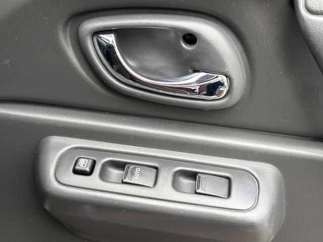 ジムニー クロスアドベンチャー　禁煙　パートタイム４ＷＤ　背面タイヤ　ＥＴＣ　ナビ　地デジＴＶ　ＤＶＤ　ＵＳＢ　シートヒーター　ハーフレザーシート　純正フロアマット　純正アルミホイール　ドアバイザー　フォグランプ　保証書　取扱説明書（18枚目）