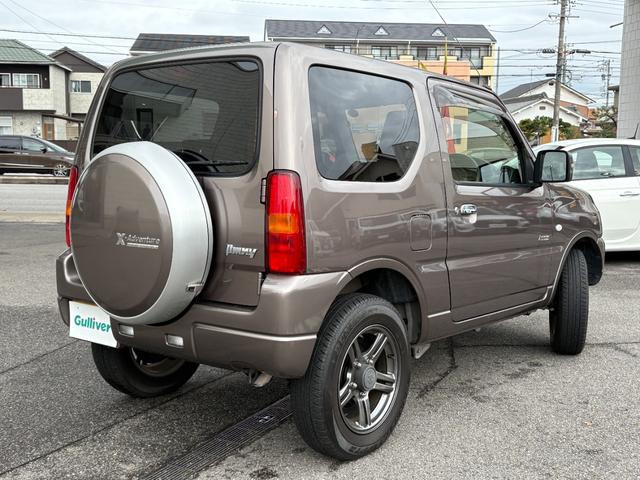 ジムニー クロスアドベンチャー　禁煙　パートタイム４ＷＤ　背面タイヤ　ＥＴＣ　ナビ　地デジＴＶ　ＤＶＤ　ＵＳＢ　シートヒーター　ハーフレザーシート　純正フロアマット　純正アルミホイール　ドアバイザー　フォグランプ　保証書　取扱説明書（45枚目）