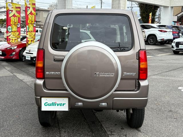 ジムニー クロスアドベンチャー　禁煙　パートタイム４ＷＤ　背面タイヤ　ＥＴＣ　ナビ　地デジＴＶ　ＤＶＤ　ＵＳＢ　シートヒーター　ハーフレザーシート　純正フロアマット　純正アルミホイール　ドアバイザー　フォグランプ　保証書　取扱説明書（46枚目）