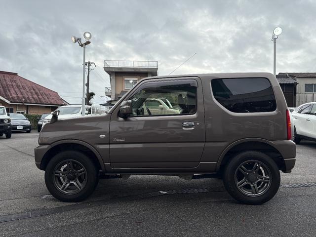 ジムニー クロスアドベンチャー　禁煙　パートタイム４ＷＤ　背面タイヤ　ＥＴＣ　ナビ　地デジＴＶ　ＤＶＤ　ＵＳＢ　シートヒーター　ハーフレザーシート　純正フロアマット　純正アルミホイール　ドアバイザー　フォグランプ　保証書　取扱説明書（48枚目）