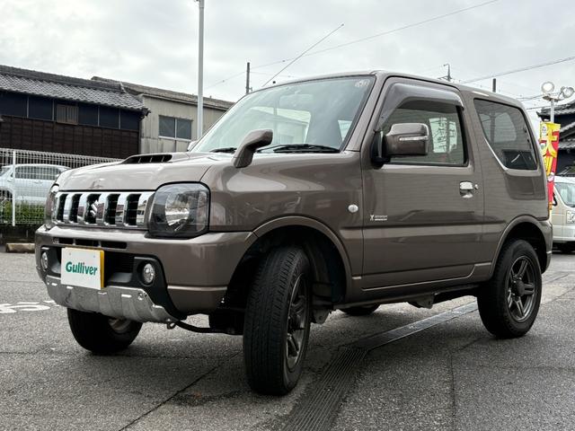 ジムニー クロスアドベンチャー　禁煙　パートタイム４ＷＤ　背面タイヤ　ＥＴＣ　ナビ　地デジＴＶ　ＤＶＤ　ＵＳＢ　シートヒーター　ハーフレザーシート　純正フロアマット　純正アルミホイール　ドアバイザー　フォグランプ　保証書　取扱説明書（49枚目）