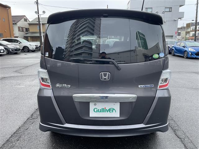 フリードスパイクハイブリッド ハイブリッド ワンオーナー 前後方向ドライブレコーダー 純正メモリナビ SD USB CD DVD バックカメラ 両側スライドドア ステアリングリモコン オートライト ETC 純正ゴムマット HIDライト(7枚目)