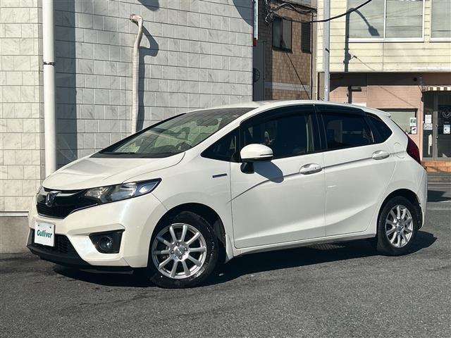 フィットハイブリッド Ｆパッケージ　純正ナビ　ＣＤ　ＤＶＤ　ＦＭ　ＡＭ　ＳＤ　ＵＳＢ　ＡＵＸ　ＢＴ　フルセグＴＶ　Ｂカメラ　前方ドラレコ　ＥＴＣ　ＡＢＳ　プッシュスタート　横滑り防止装置　純正フロアマット　ドアバイザー　フォグライト（27枚目）