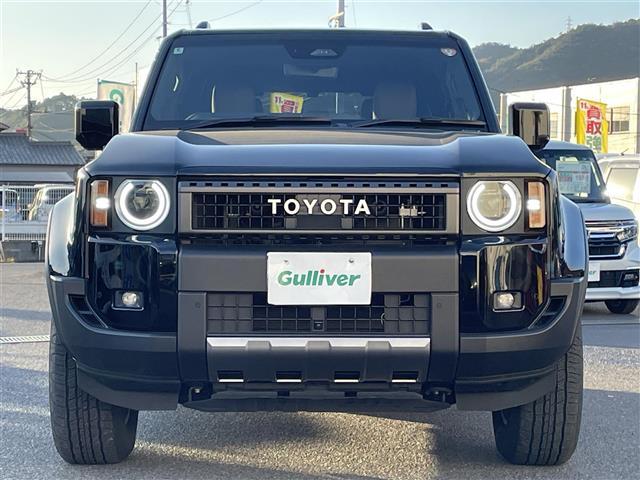 ランドクルーザー２５０ ＶＸファーストエディション　丸目ヘッドライト／アドバンストドライブ／ワンオーナー／サンルーフ／純正ナビ（フルセグＴＶ／ＨＤＭＩ／Ｂｌｕｅｔｏｏｔｈ）／ＪＢＬサウンド／全方位モニター／置くだけ充電／デジタルインナーミラー／茶レザー（3枚目）