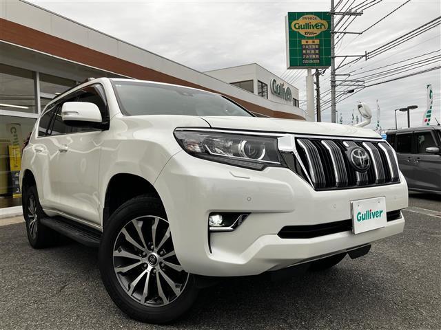 ランドクルーザープラド TX Lパッケージ リアカメラ 追従クルーズ BTオーディオ 車線逸脱 パーキングセンサー 1オ-ナ- スマートキ ヒーター キーレスエントリー 3列席 DVD再生可 エアコン LEDランプ レザー パートタイム4WD(2枚目)
