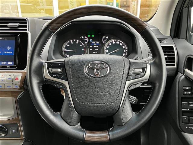 ランドクルーザープラド TX Lパッケージ リアカメラ 追従クルーズ BTオーディオ 車線逸脱 パーキングセンサー 1オ-ナ- スマートキ ヒーター キーレスエントリー 3列席 DVD再生可 エアコン LEDランプ レザー パートタイム4WD(5枚目)