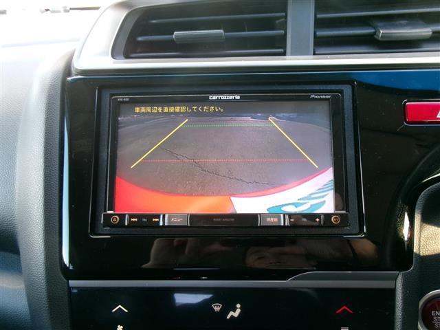 フィット １３Ｇ・Ｆパッケージ　ブルートゥース　ワンオーナー車　ＬＥＤライト　ＤＶＤ再生可能　スマ－トキ－　Ａライト　ＶＳＡ　ＥＴＣ付き　地デジＴＶ　助手席エアバッグ　メモリーナビ　Ｒカメラ　オートエアコン　エアバック　ＰＳ　Ｄレコ（3枚目）