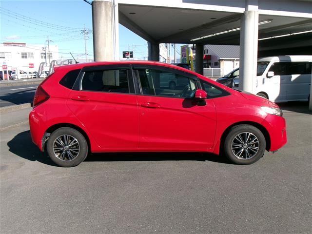 フィット １３Ｇ・Ｆパッケージ　ブルートゥース　ワンオーナー車　ＬＥＤライト　ＤＶＤ再生可能　スマ－トキ－　Ａライト　ＶＳＡ　ＥＴＣ付き　地デジＴＶ　助手席エアバッグ　メモリーナビ　Ｒカメラ　オートエアコン　エアバック　ＰＳ　Ｄレコ（25枚目）