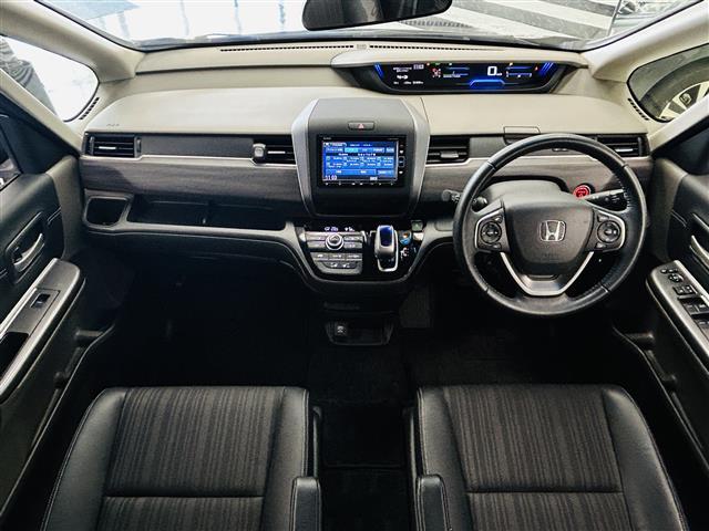 フリードハイブリッド ハイブリッド・EX LEDヘッドライト アクティブコーナリングライト Sパッケージ Cパッケージ コンフォートビューパッケージ 運転席&助手席シートヒーター 両側パワスラ 純正ナビ バックカメラ ETC 純正ドラレコ(2枚目)