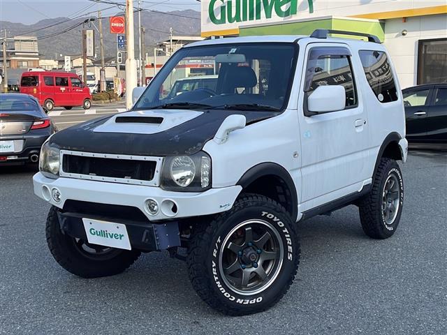 ジムニー ＸＣ　リフトアップ２インチ　社外１６インチＡＷ　社外バンパー　社外ヘッドライト　社外フォグランプ　社外テールランプ　社外カーボンボンネット　社外グリル　社外マフラー　純正キーレス　純正フロアマット（27枚目）