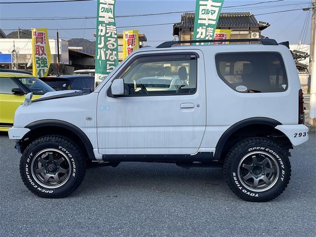 ジムニー ＸＣ　リフトアップ２インチ　社外１６インチＡＷ　社外バンパー　社外ヘッドライト　社外フォグランプ　社外テールランプ　社外カーボンボンネット　社外グリル　社外マフラー　純正キーレス　純正フロアマット（28枚目）