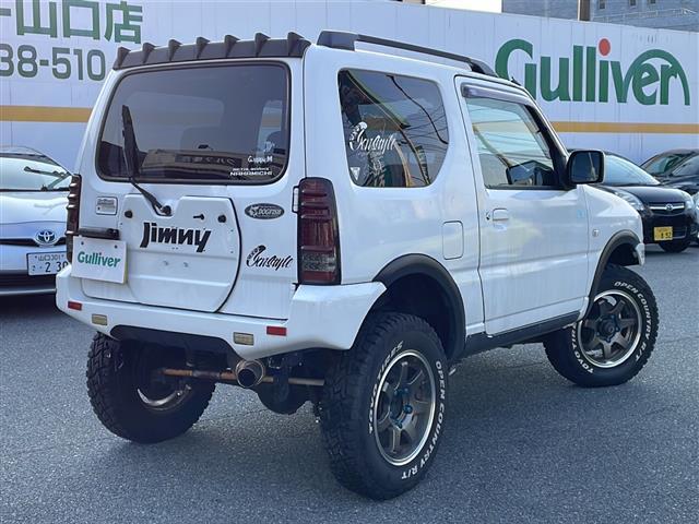 ジムニー ＸＣ　リフトアップ２インチ　社外１６インチＡＷ　社外バンパー　社外ヘッドライト　社外フォグランプ　社外テールランプ　社外カーボンボンネット　社外グリル　社外マフラー　純正キーレス　純正フロアマット（30枚目）