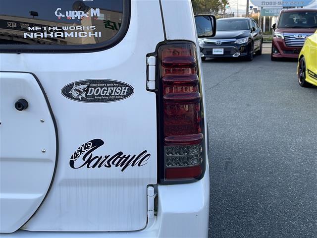 ジムニー ＸＣ　リフトアップ２インチ　社外１６インチＡＷ　社外バンパー　社外ヘッドライト　社外フォグランプ　社外テールランプ　社外カーボンボンネット　社外グリル　社外マフラー　純正キーレス　純正フロアマット（33枚目）