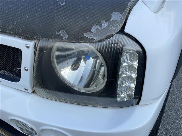 ジムニー ＸＣ　リフトアップ２インチ　社外１６インチＡＷ　社外バンパー　社外ヘッドライト　社外フォグランプ　社外テールランプ　社外カーボンボンネット　社外グリル　社外マフラー　純正キーレス　純正フロアマット（37枚目）