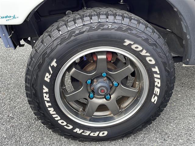 ジムニー ＸＣ　リフトアップ２インチ　社外１６インチＡＷ　社外バンパー　社外ヘッドライト　社外フォグランプ　社外テールランプ　社外カーボンボンネット　社外グリル　社外マフラー　純正キーレス　純正フロアマット（40枚目）