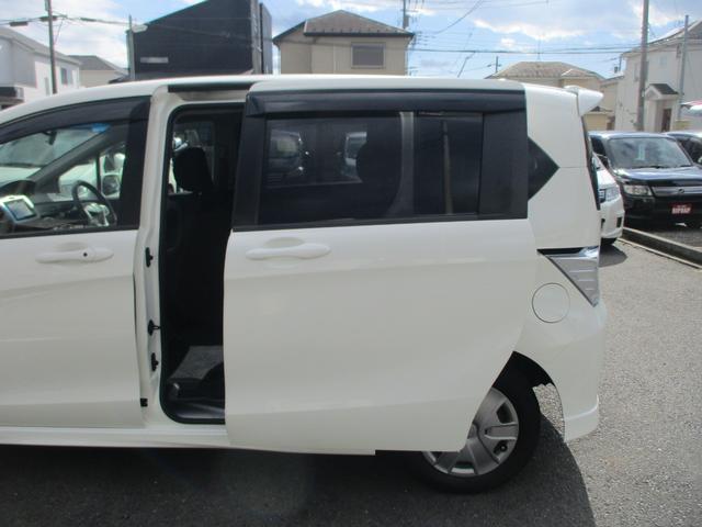 フリードハイブリッド ジャストセレクション スマートキー 電動スライドドア 純正ナビ バックカメラ ETC HIDライト オートクルーズコントロール 2列目キャプテンシートタイプ 3列シート6人乗り(6枚目)