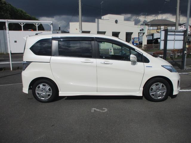 フリードハイブリッド ジャストセレクション スマートキー 電動スライドドア 純正ナビ バックカメラ ETC HIDライト オートクルーズコントロール 2列目キャプテンシートタイプ 3列シート6人乗り(42枚目)