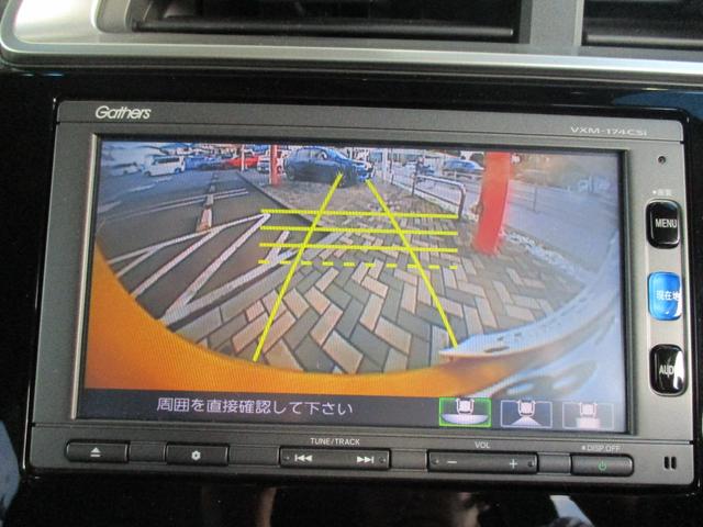 フィットハイブリッド Lホンダセンシング 禁煙車 ナビ バックカメラ ETC 前後ドラレコ ホンダセンシング ハイブリット スマートキー 軽減ブレーキ Rカメ LED サイドSRS 横滑り防止 ドライブレコーダー 記録簿 パワーステアリング(4枚目)