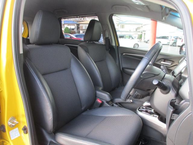 フィットハイブリッド Lホンダセンシング 禁煙車 ナビ バックカメラ ETC 前後ドラレコ ホンダセンシング ハイブリット スマートキー 軽減ブレーキ Rカメ LED サイドSRS 横滑り防止 ドライブレコーダー 記録簿 パワーステアリング(9枚目)