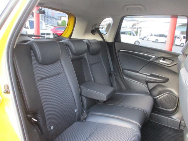 フィットハイブリッド Lホンダセンシング 禁煙車 ナビ バックカメラ ETC 前後ドラレコ ホンダセンシング ハイブリット スマートキー 軽減ブレーキ Rカメ LED サイドSRS 横滑り防止 ドライブレコーダー 記録簿 パワーステアリング(12枚目)