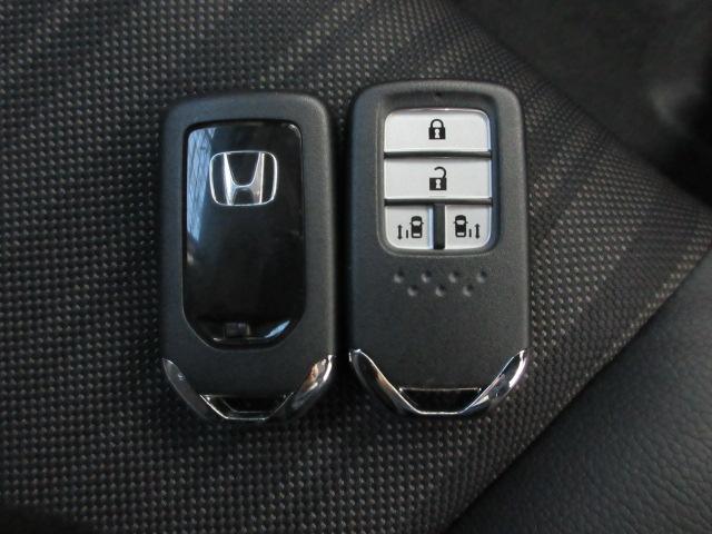 フリード G・ホンダセンシング 6人 メモリーナビ リアカメラ 両側電動スライドドア ETC 純正アルミ LEDヘッドライト Bluetooth ドアバイザー ワンオーナー 追突被害軽減ブレーキ iストップ Wエアバッグ 1オ-ナ-(12枚目)