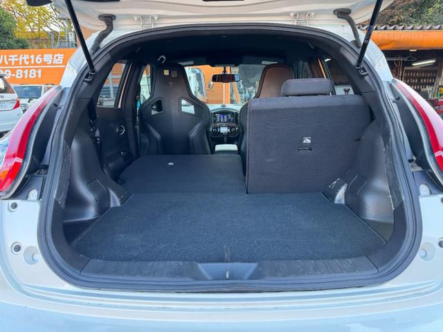 ジューク ニスモ　ＲＳ　純正レカロシート　４ＷＤ　１．６ターボエンジン　パドルシフト　ｎｉｓｍｏ製１８インチＡＷ　フジツボマフラー　ｎｉｓｍｏローダウンスプリング　純正ナビ　地デジＴＶ　Ｂｌｕｅｔｏｏｔｈオーディオ　ＨＩＤ（31枚目）