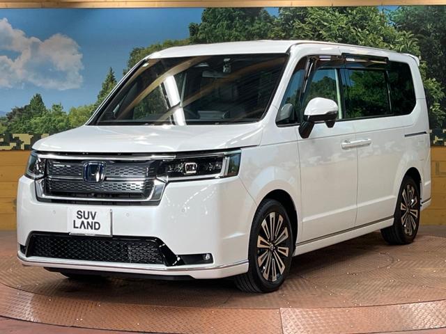 ステップワゴン ｅ：ＨＥＶスパーダ　プレミアムライン　後席モニター　１１型ナビ　全周囲カメラ　両側電動ドア　ブラインドスポットモニター　パワーバックドア　禁煙　シートヒーター　ＬＥＤヘッド＆フォグ　純正１７インチアルミ　フルセグ　レーダークルーズ　ＥＴＣ（57枚目）