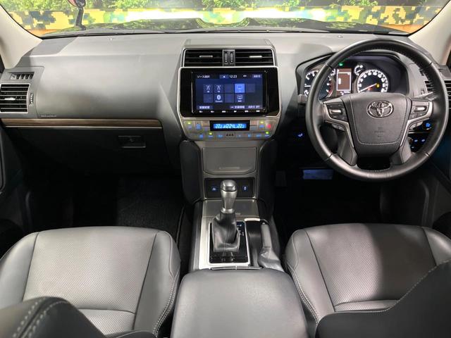 ランドクルーザープラド TX Lパッケージ サンルーフ 7人乗り 9型ナビ 黒革シート ブラックルーフレール シートエアコン セーフティセンス レーダークルーズ クリアランスソナー LEDヘッド 純正17アルミ バックカメラ ETC フルセグ(2枚目)