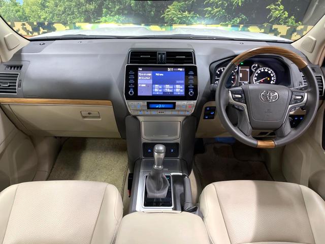 ランドクルーザープラド TX Lパッケージ マットブラックエディション サンルーフ メーカーナビ 全周囲カメラ 7人 ブラインドスポットモニター 純正サイドステップ 寒冷地仕様 禁煙車 ベージュ革シート レーダークルーズ シートベンチレーション セーフティセンス ETC(2枚目)