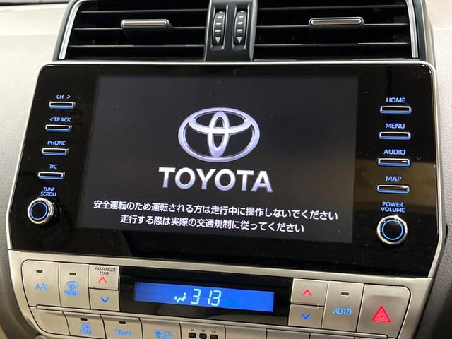 ランドクルーザープラド TX Lパッケージ マットブラックエディション サンルーフ メーカーナビ 全周囲カメラ 7人 ブラインドスポットモニター 純正サイドステップ 寒冷地仕様 禁煙車 ベージュ革シート レーダークルーズ シートベンチレーション セーフティセンス ETC(4枚目)