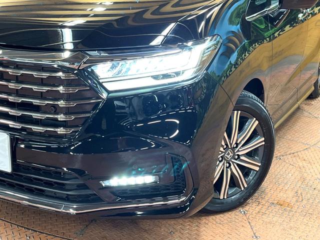 オデッセイハイブリッド e:HEVアブソルート 後席モニター 11型ナビ 全周囲カメラ 禁煙車 両側電動ドア ホンダセンシング ブラインドスポットモニター レザーシート シートヒーター LEDヘッド クリアランスソナー パワーシート ETC(12枚目)