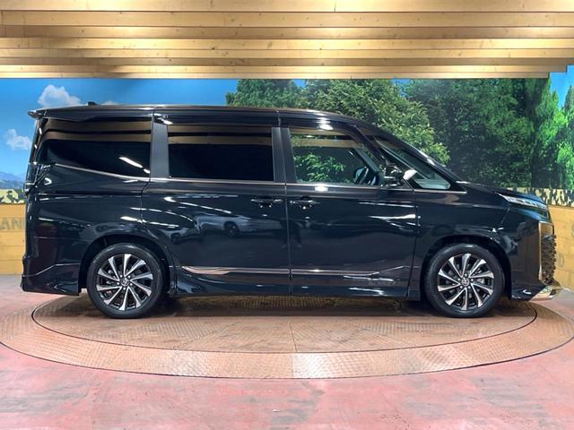 ヴォクシー ハイブリッドS-Z モデリスタエアロ 後席モニター 10型ナビ 快適利便パッケージ 両側電動ドア 禁煙車 100V電源 電動リアドア デジタルインナーミラー シートヒータ― ハンドルヒーター 純正17インチアルミ ETC(63枚目)