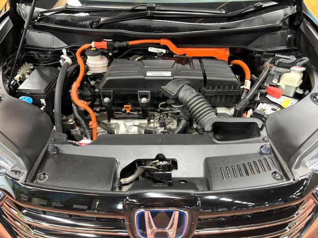 オデッセイハイブリッド e:HEVアブソルート・EX 禁煙車 10型ナビ 全周囲カメラ 両側電動ドア 7人乗り デジタルインナーミラー ブラインドスポットモニター シートヒーター パワーバックドア AC100V電源 レーダークルーズ ホンダセンシング(18枚目)