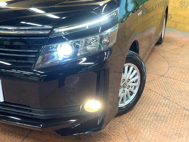 ヴォクシー ハイブリッドV 後席モニター 8型ナビ 両側パワスラ 7人乗り 禁煙車 シートヒーター クルコン LEDヘッド 純正15アルミ リアオートエアコン オートライト コーナーセンサー バックカメラ ETC フルセグTV(12枚目)