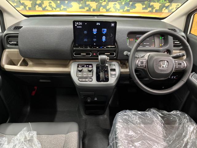 フリード e:HEVエアー EX 登録済未使用車 11型ナビ 両側電動ドア 後席ウォークスルー ブラインドスポットモニター シートヒーター レーダークルーズ バックカメラ 純正15インチアルミ LEDヘッド クリアランスソナー(2枚目)