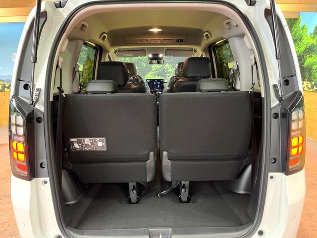 フリード e:HEVエアー EX 登録済未使用車 11型ナビ 両側電動ドア 後席ウォークスルー ブラインドスポットモニター シートヒーター レーダークルーズ バックカメラ 純正15インチアルミ LEDヘッド クリアランスソナー(11枚目)