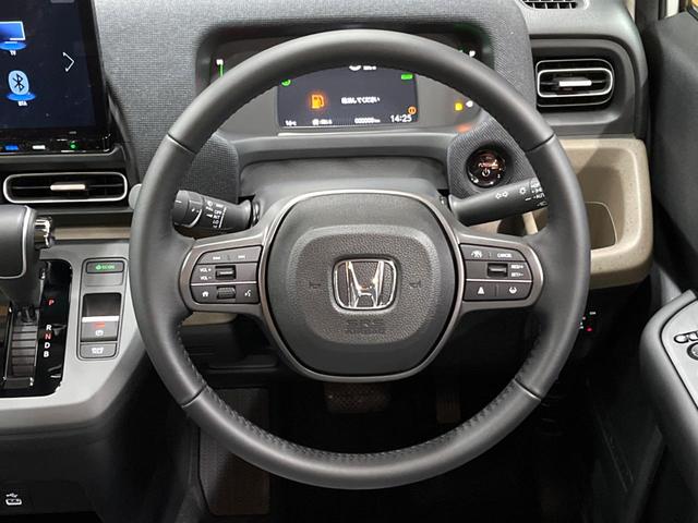 フリード e:HEVエアー EX 登録済未使用車 11型ナビ 両側電動ドア 後席ウォークスルー ブラインドスポットモニター シートヒーター レーダークルーズ バックカメラ 純正15インチアルミ LEDヘッド クリアランスソナー(12枚目)